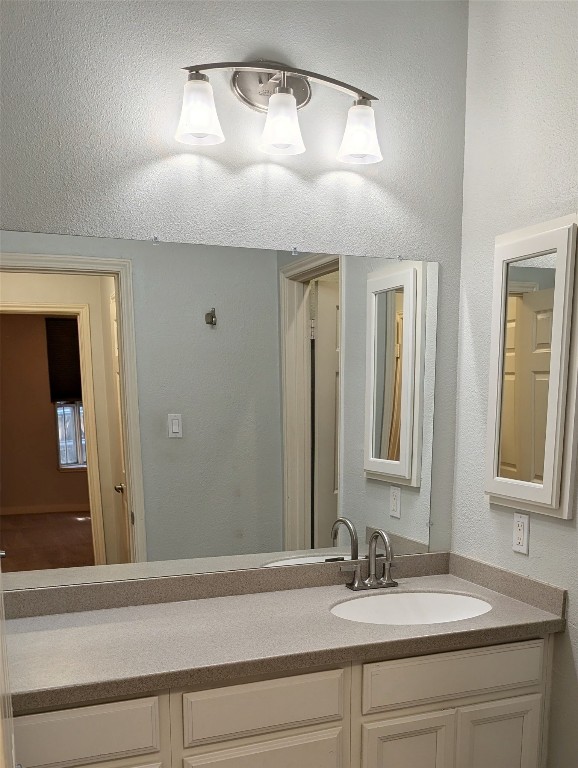 2529 Rio Grande Street, Unit 6 Austin, TX 78705 - Photo 11 of 19 a bathroom with a sink and a mirror