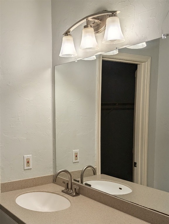 2529 Rio Grande Street, Unit 6 Austin, TX 78705 - Photo 16 of 19 a bathroom with a sink and a mirror