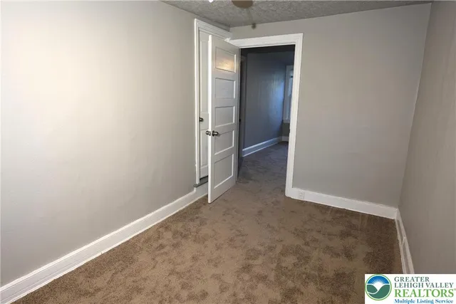 an empty room with closet