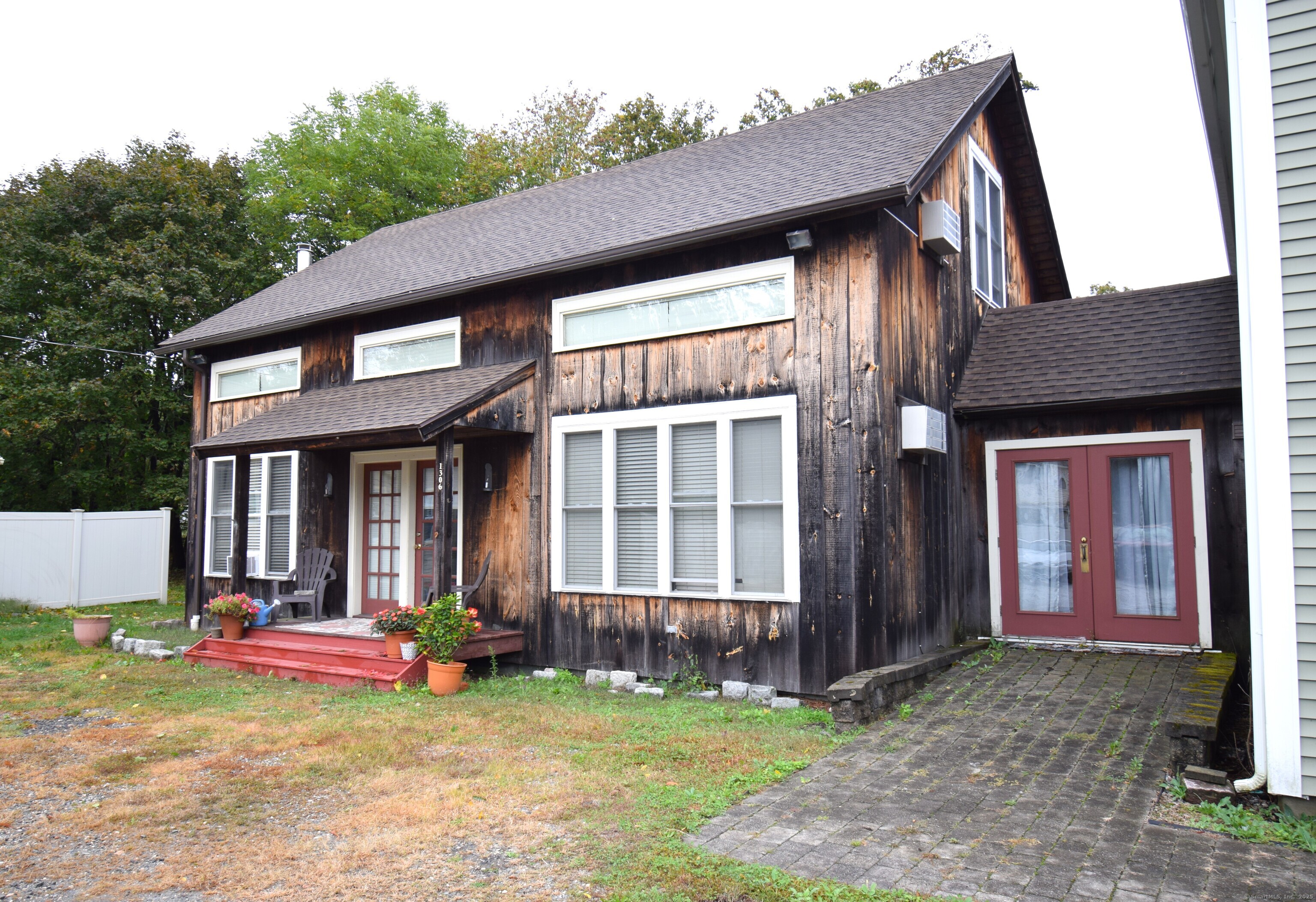 a house view with a garden space
