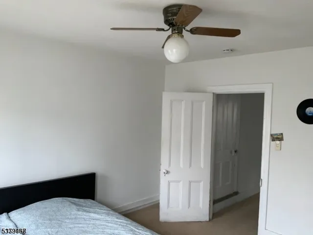 a view of bedroom and bathroom