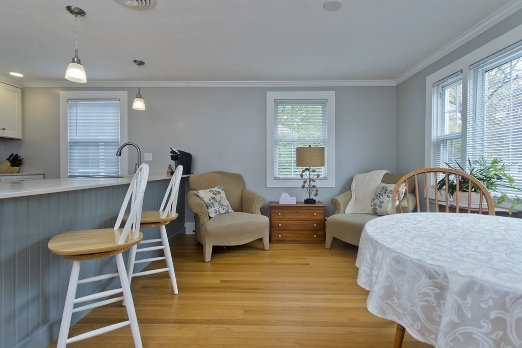 30 Endecott Street Springfield, MA 01118 - Photo 11 of 40 a living room with furniture and a large window