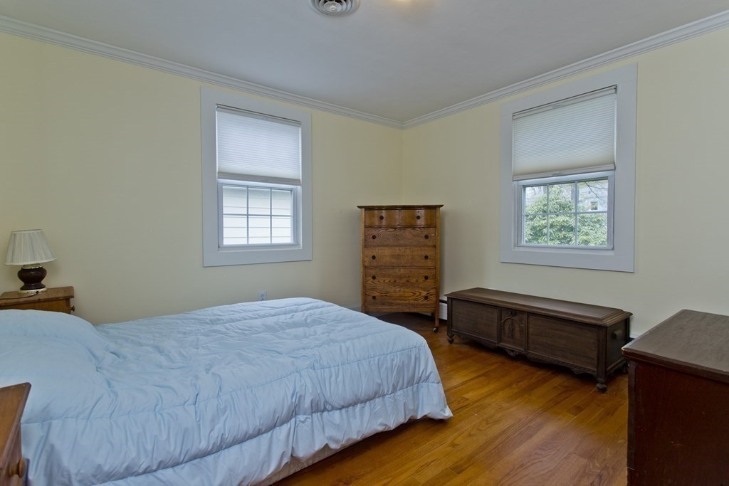 30 Endecott Street Springfield, MA 01118 - Photo 12 of 40 a bedroom with furniture and a window