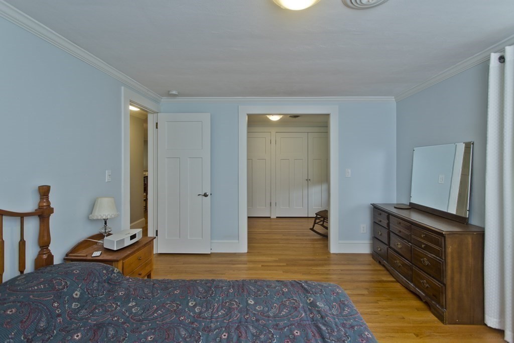 30 Endecott Street Springfield, MA 01118 - Photo 15 of 40 a living room with stainless steel appliances furniture a fireplace and a flat screen tv