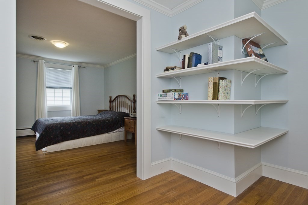 30 Endecott Street Springfield, MA 01118 - Photo 20 of 40 a bedroom with a bed and a window