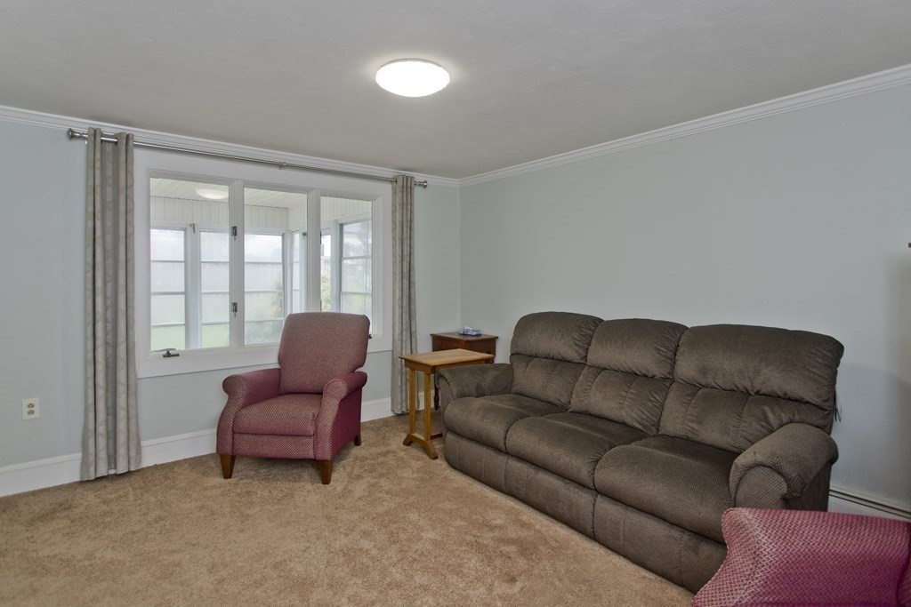 30 Endecott Street Springfield, MA 01118 - Photo 24 of 40 a living room with furniture and a window