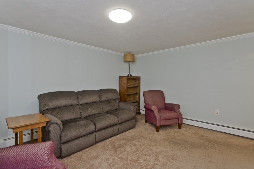 30 Endecott Street Springfield, MA 01118 - Photo 25 of 40 a living room with furniture