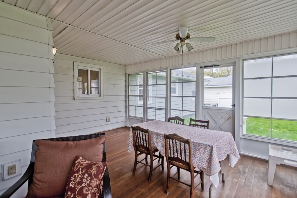 30 Endecott Street Springfield, MA 01118 - Photo 29 of 40 a view of a dining room with furniture window and wooden floor