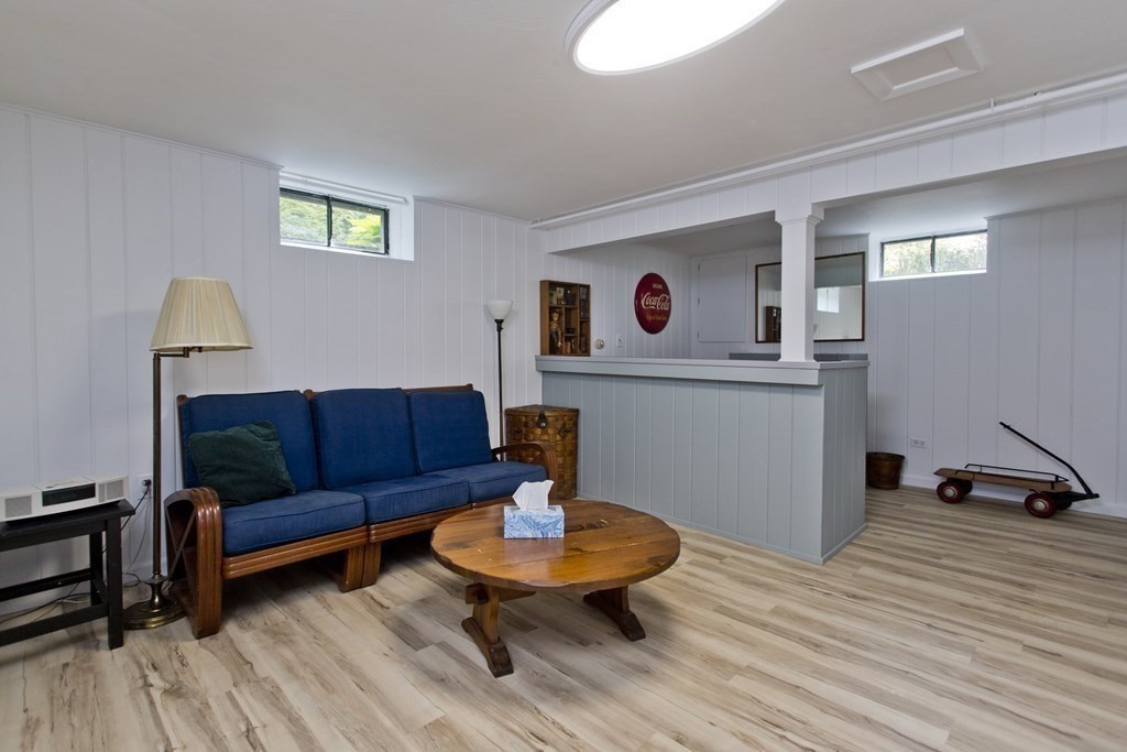 30 Endecott Street Springfield, MA 01118 - Photo 34 of 40 a living room with furniture and a wooden floor