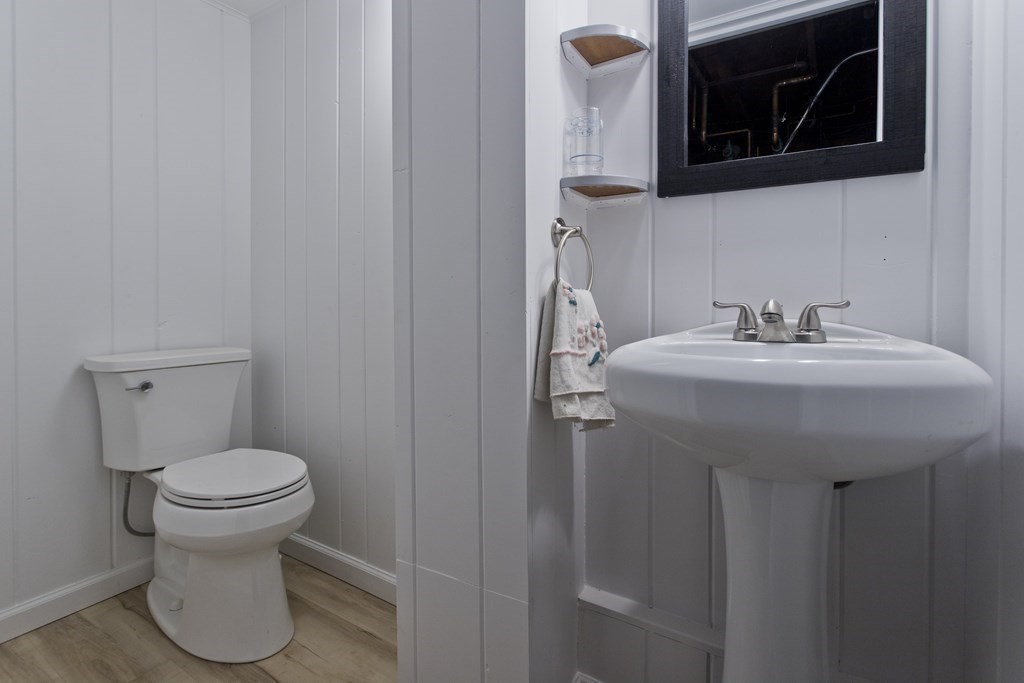 30 Endecott Street Springfield, MA 01118 - Photo 35 of 40 a bathroom with a sink and a toilet