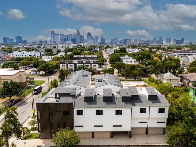 a view of city with tall buildings