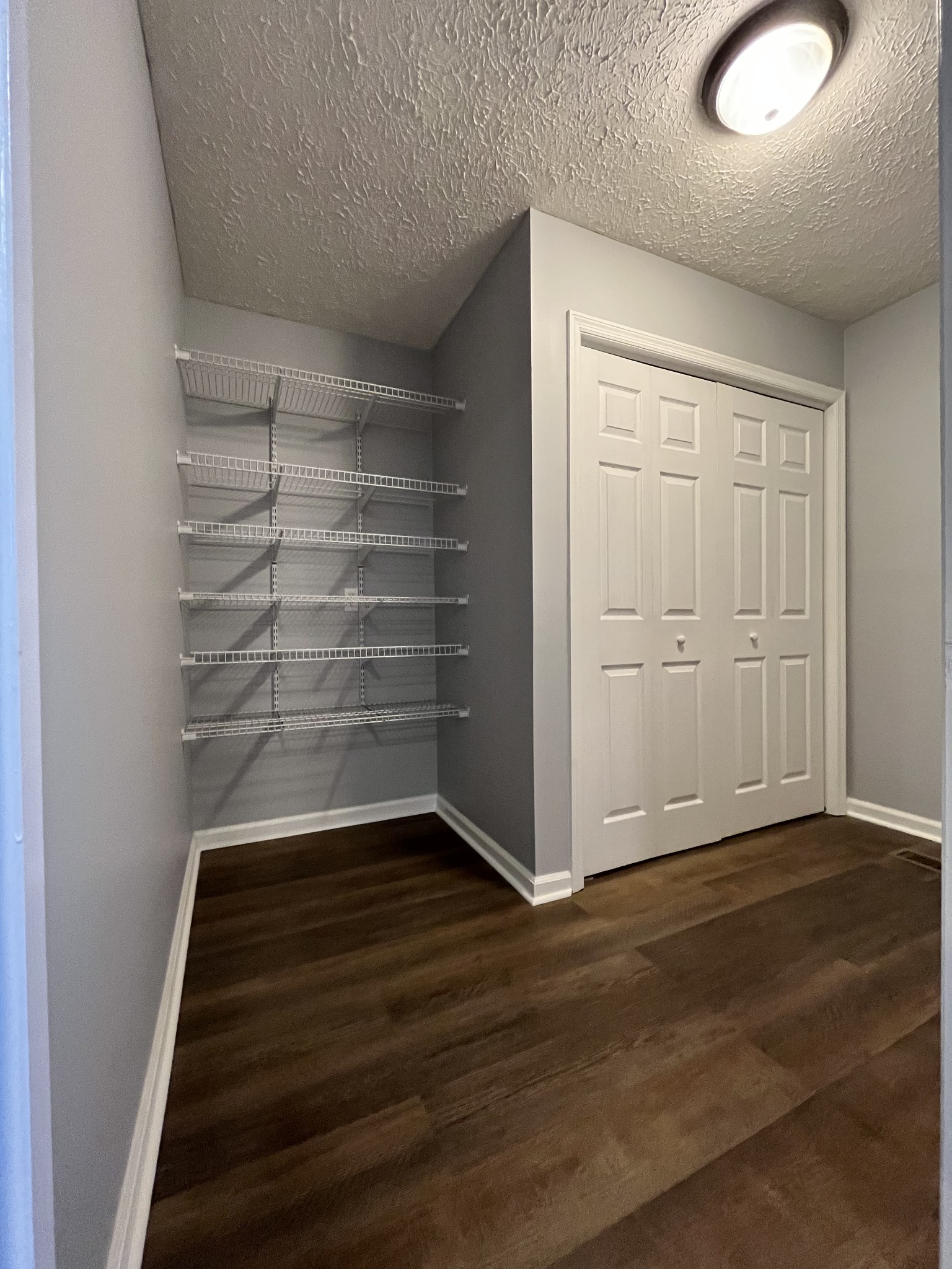 2741 Gideon Road Greenbrier, TN 37073 - Photo 8 of 12 an empty room with wooden floor