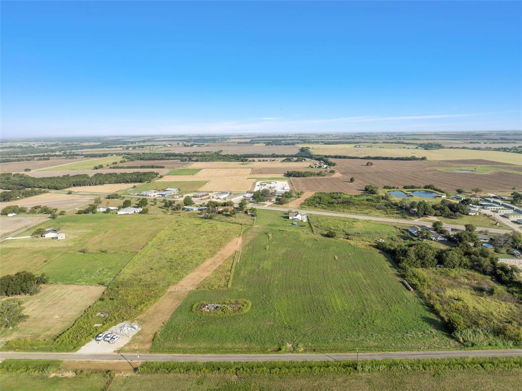 460 Hajek Road West, TX 76691 - Photo 1 of 1 Aerial view of property's location with farmland and rural landscape