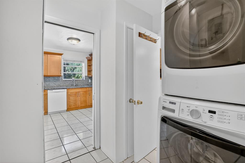 4631 Southwest 54th Terrace Davie, FL 33314 - Photo 18 of 42 a utility room with dryer and washer