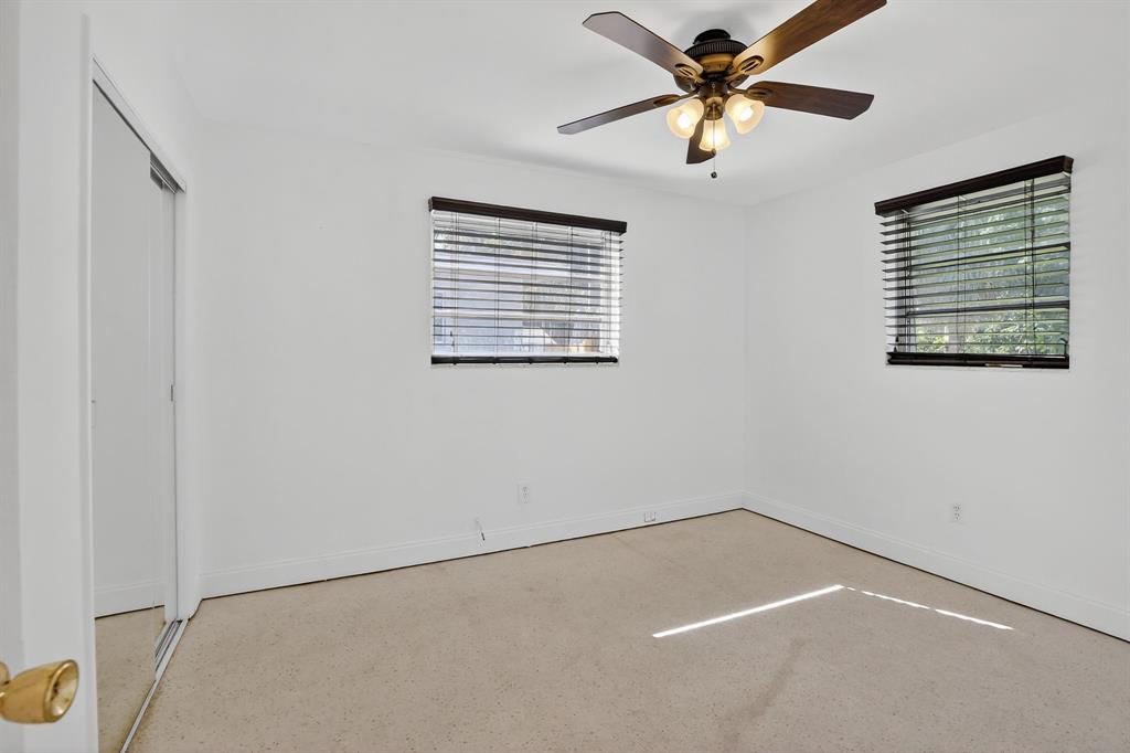 4631 Southwest 54th Terrace Davie, FL 33314 - Photo 27 of 42 a view of a room with a ceiling fan and a window