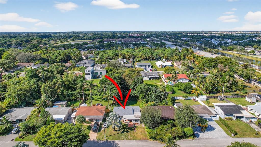 4631 Southwest 54th Terrace Davie, FL 33314 - Photo 35 of 42 an aerial view of residential houses with outdoor space and river