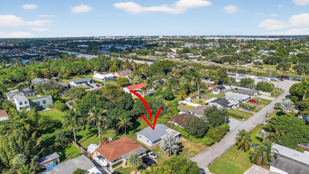 4631 Southwest 54th Terrace Davie, FL 33314 - Photo 36 of 42 an aerial view of residential houses with outdoor space and trees