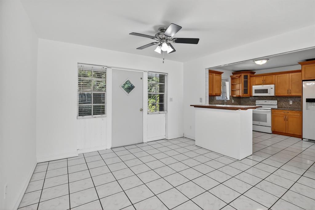 4631 Southwest 54th Terrace Davie, FL 33314 - Photo 8 of 42 a view of a kitchen with a sink cabinets and window