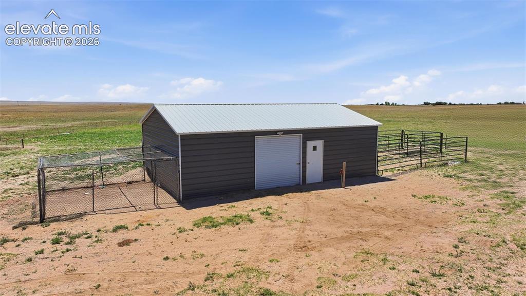 23335 Sanborn Road Calhan, CO 80808 - Photo 11 of 28 24'x36' metal building with flexible workshop, storage, or barn potential