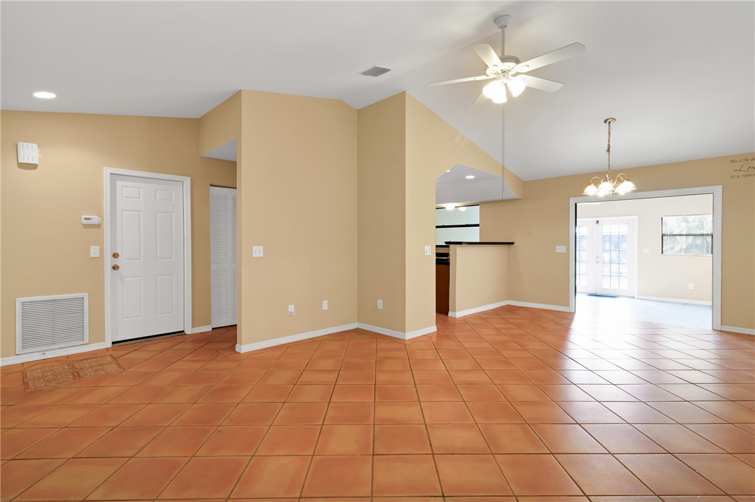 1055 Barber Street Sebastian, FL 32958 - Photo 13 of 18 a view of a kitchen with a sink and a kitchen