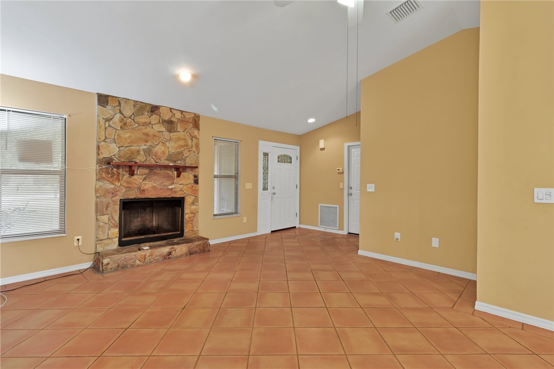1055 Barber Street Sebastian, FL 32958 - Photo 14 of 18 a view of an empty room with a fireplace