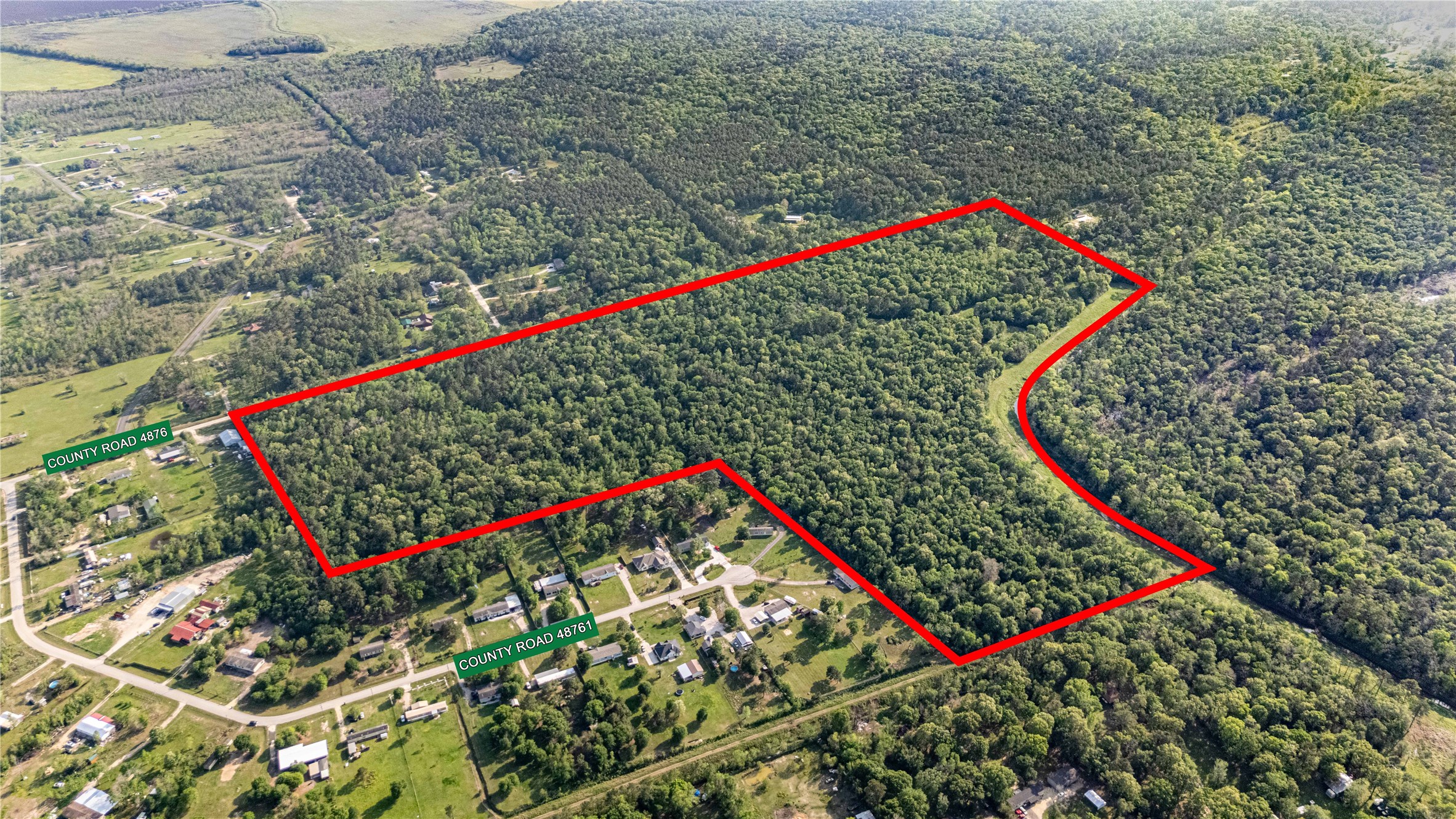 0 County Road 4876 Dayton, TX 77535 - Photo 2 of 42 a view of a small park