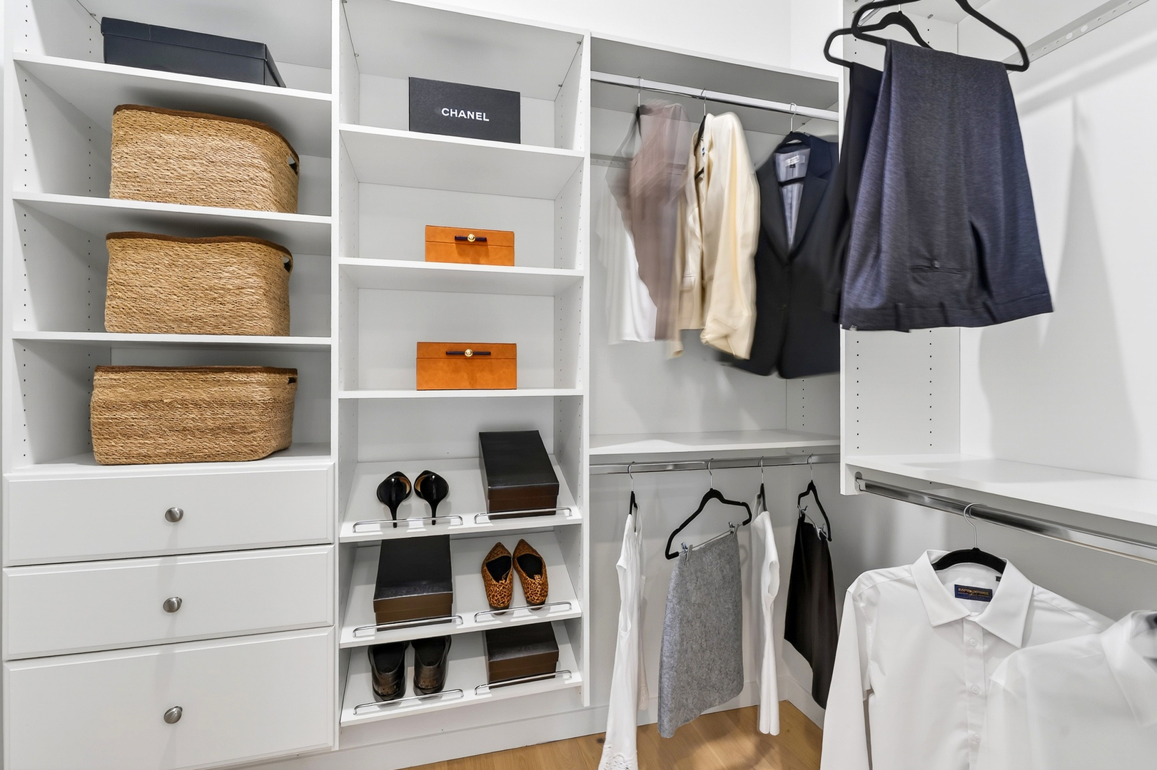 2024 West Irving Park Road, Unit 302 Chicago, IL 60618 - Photo 18 of 32 a view of walk in closet with clothes and shoes