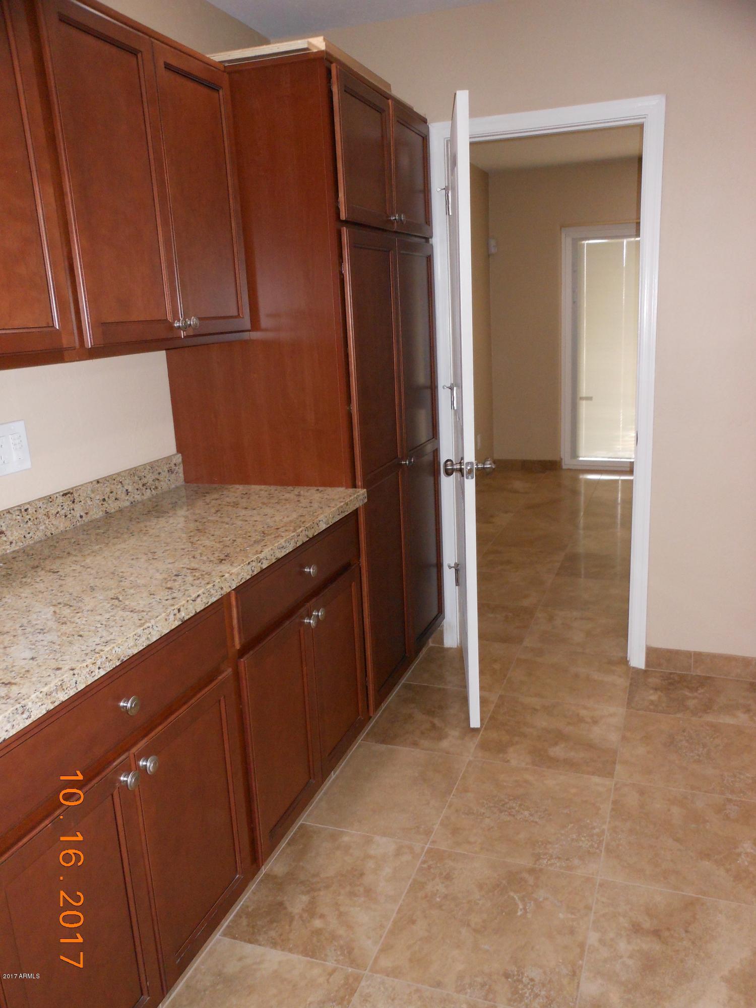 3045 West Hearn Road Phoenix, AZ 85053 - Photo 12 of 31 Extra Storage Laundry Room