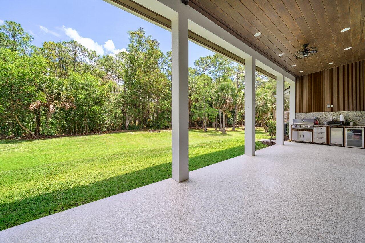 11871 160th Road North Jupiter, FL 33478 - Photo 34 of 66 Covered Lanai | Living Area