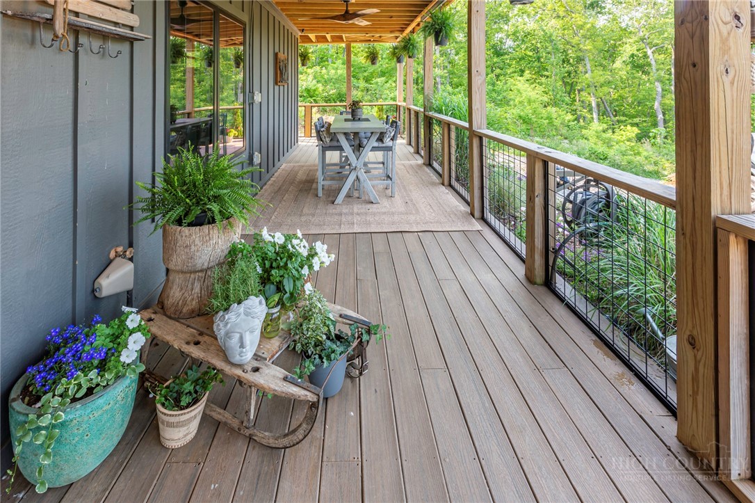 509 Grant Houck Road Todd, NC 28684 - Photo 41 of 43 a view of a two chairs with table potted plant
