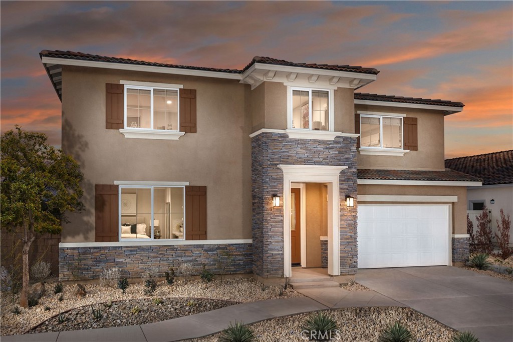 9075 Carson Avenue Hesperia, CA 92344 - Photo 1 of 13 a front view of a house with a yard and garage