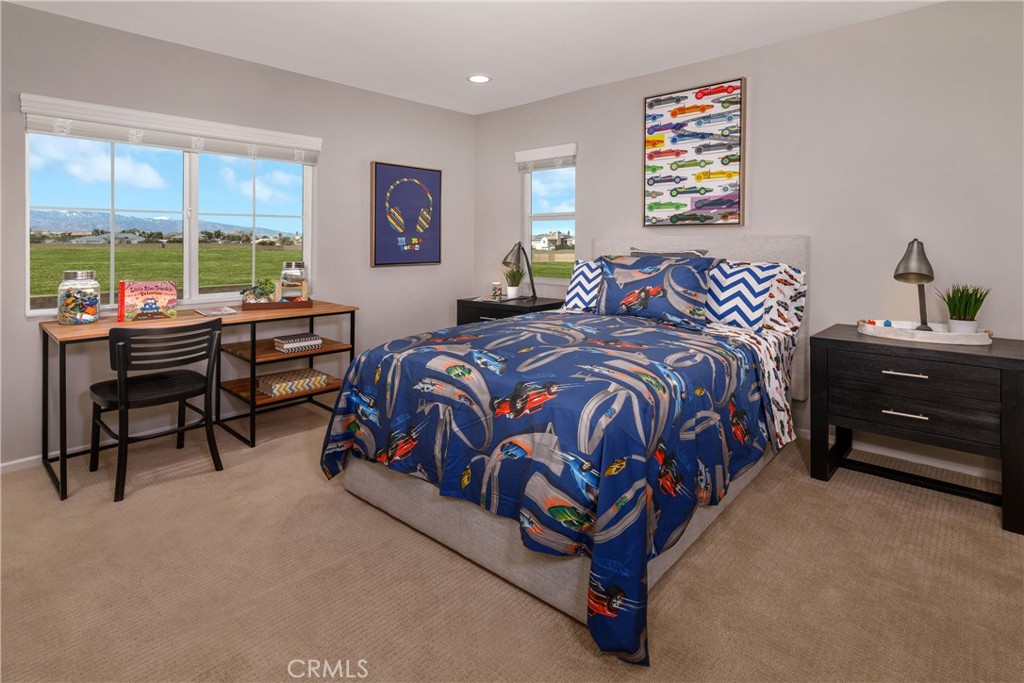 9075 Carson Avenue Hesperia, CA 92344 - Photo 11 of 13 a bedroom with bed and a window