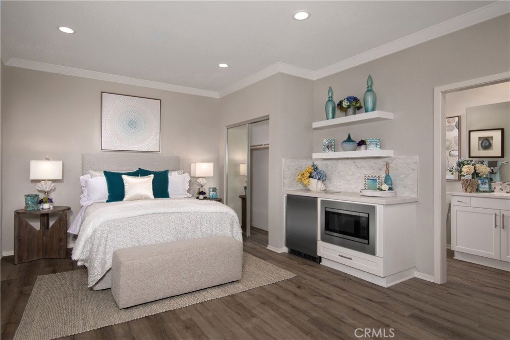9075 Carson Avenue Hesperia, CA 92344 - Photo 12 of 13 a spacious bedroom with a bed and a fireplace