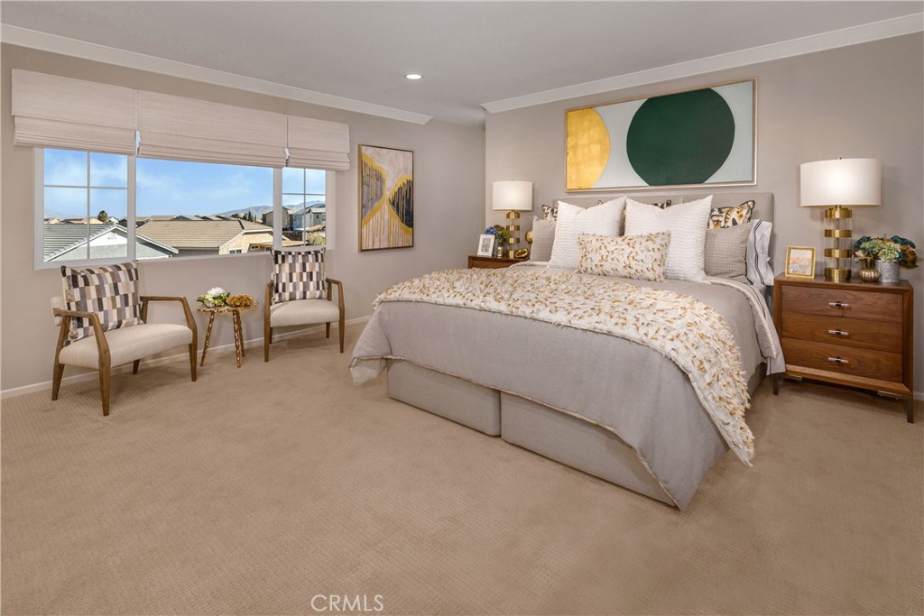 9075 Carson Avenue Hesperia, CA 92344 - Photo 7 of 13 a bedroom with a bed a chair and a large window