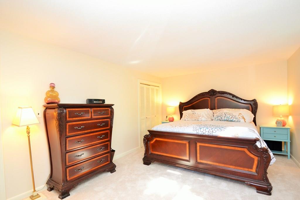 14 Sylvan Road Holbrook, MA 02343 - Photo 15 of 28 a bedroom with a bed and a dresser