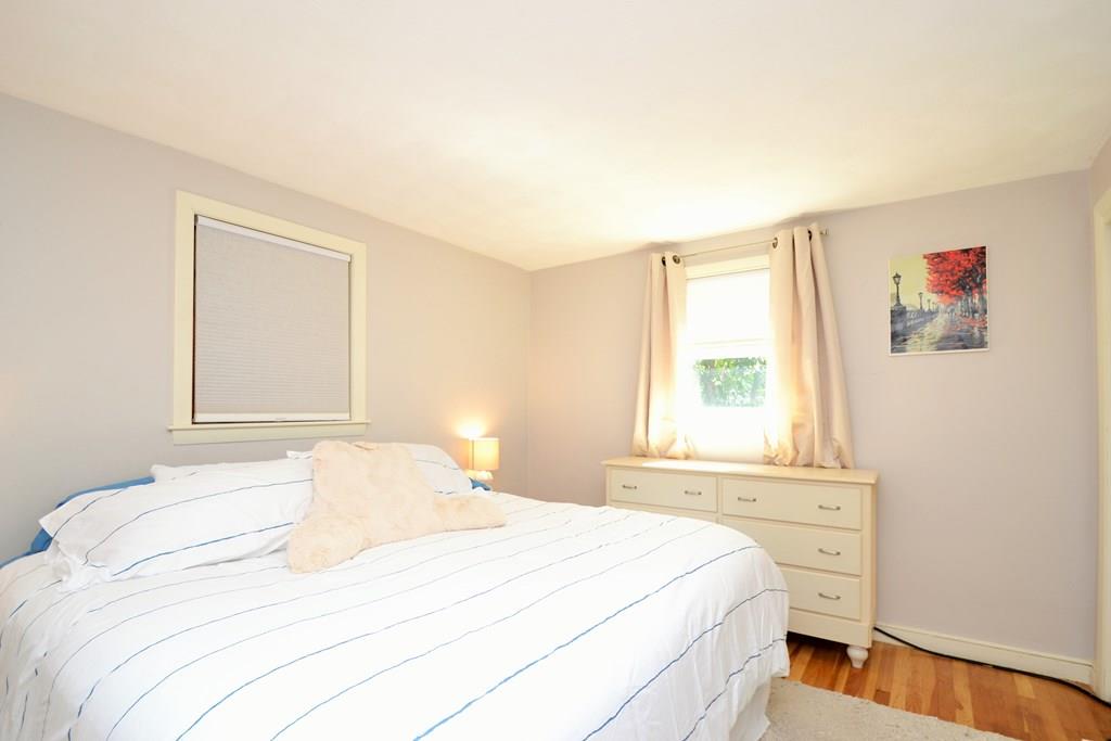 14 Sylvan Road Holbrook, MA 02343 - Photo 17 of 28 a bedroom with a bed and a window