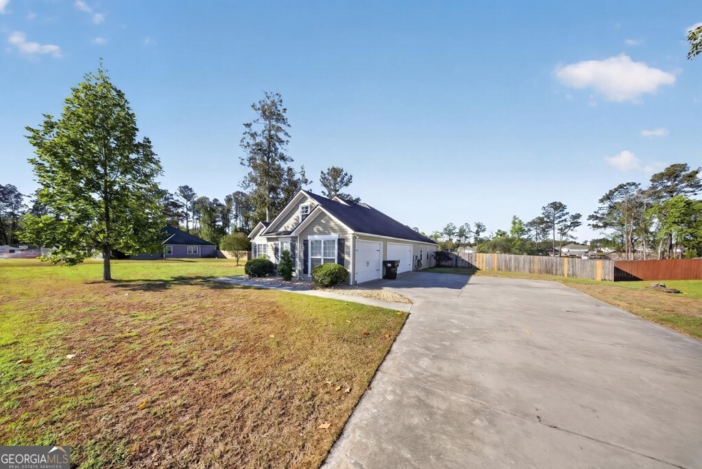 15 Ruger Circle Lakeland, GA 31635 - Photo 2 of 31 a view of a house with a yard