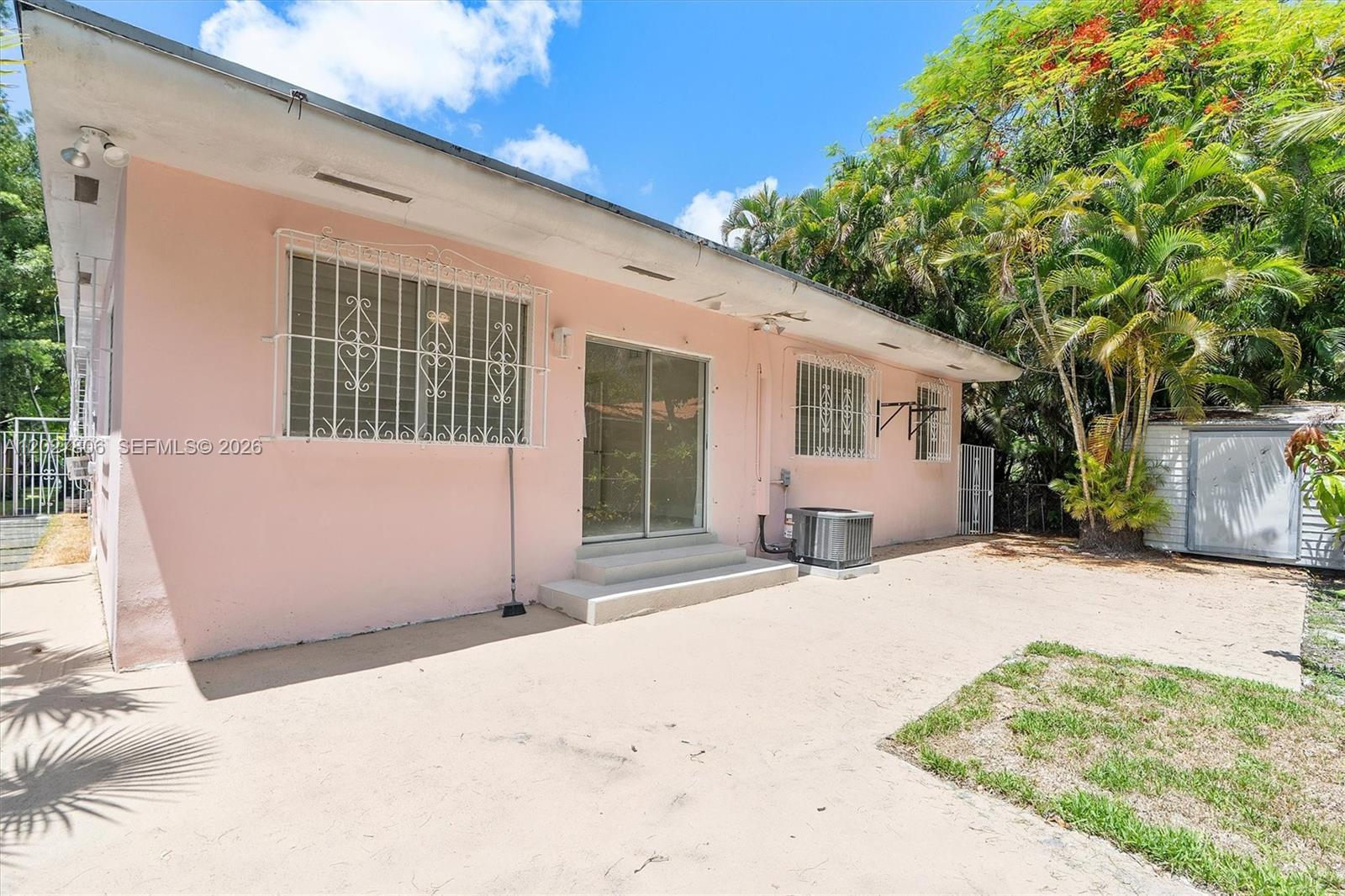 1612 Southwest 23rd Street, Unit 1612 Miami, FL 33145 - Photo 42 of 42 a view of a house with a patio