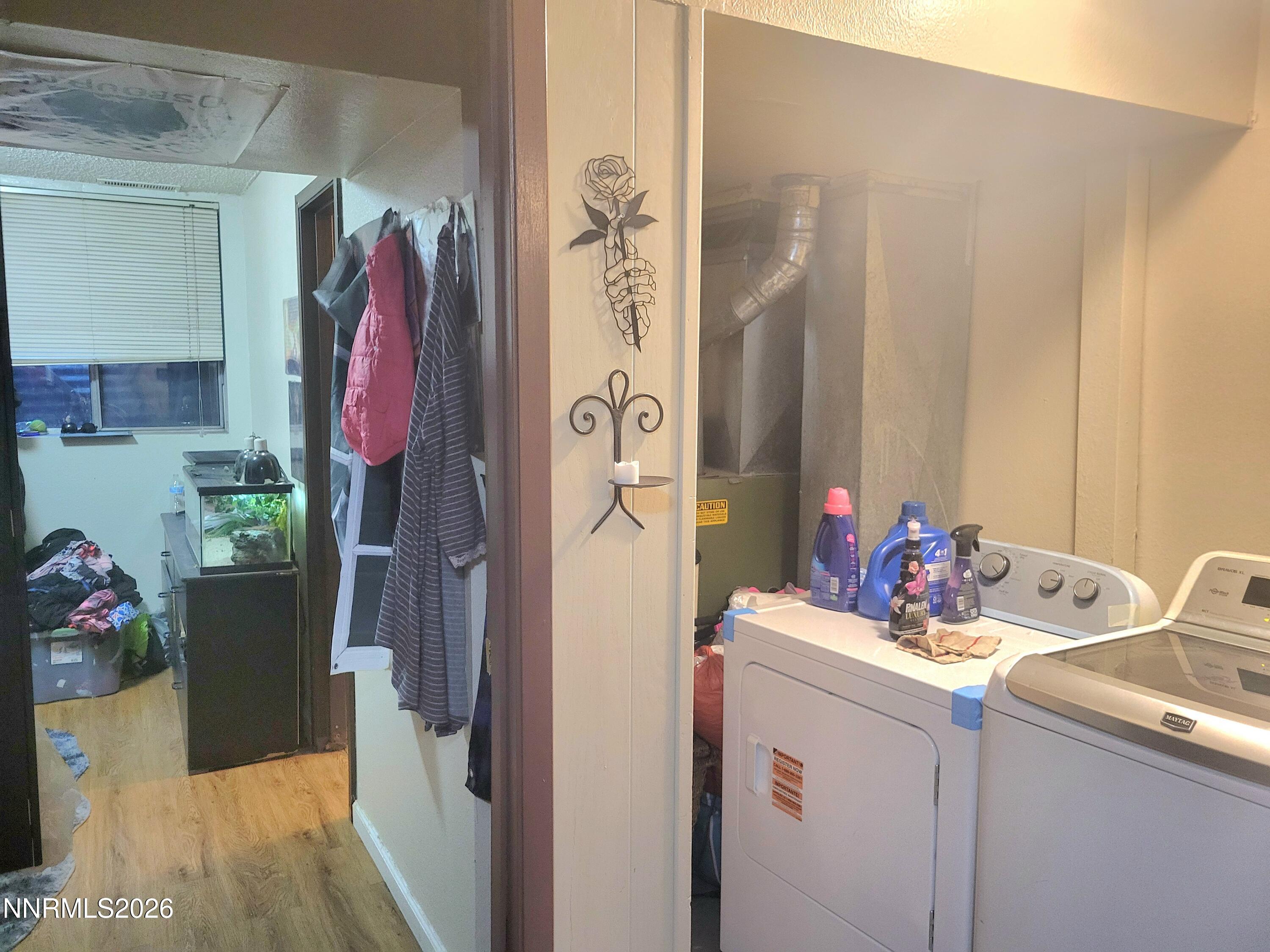 1404 East 9th Street, Unit 3 Reno, NV 89512 - Photo 19 of 29 a room with sink and washing machine