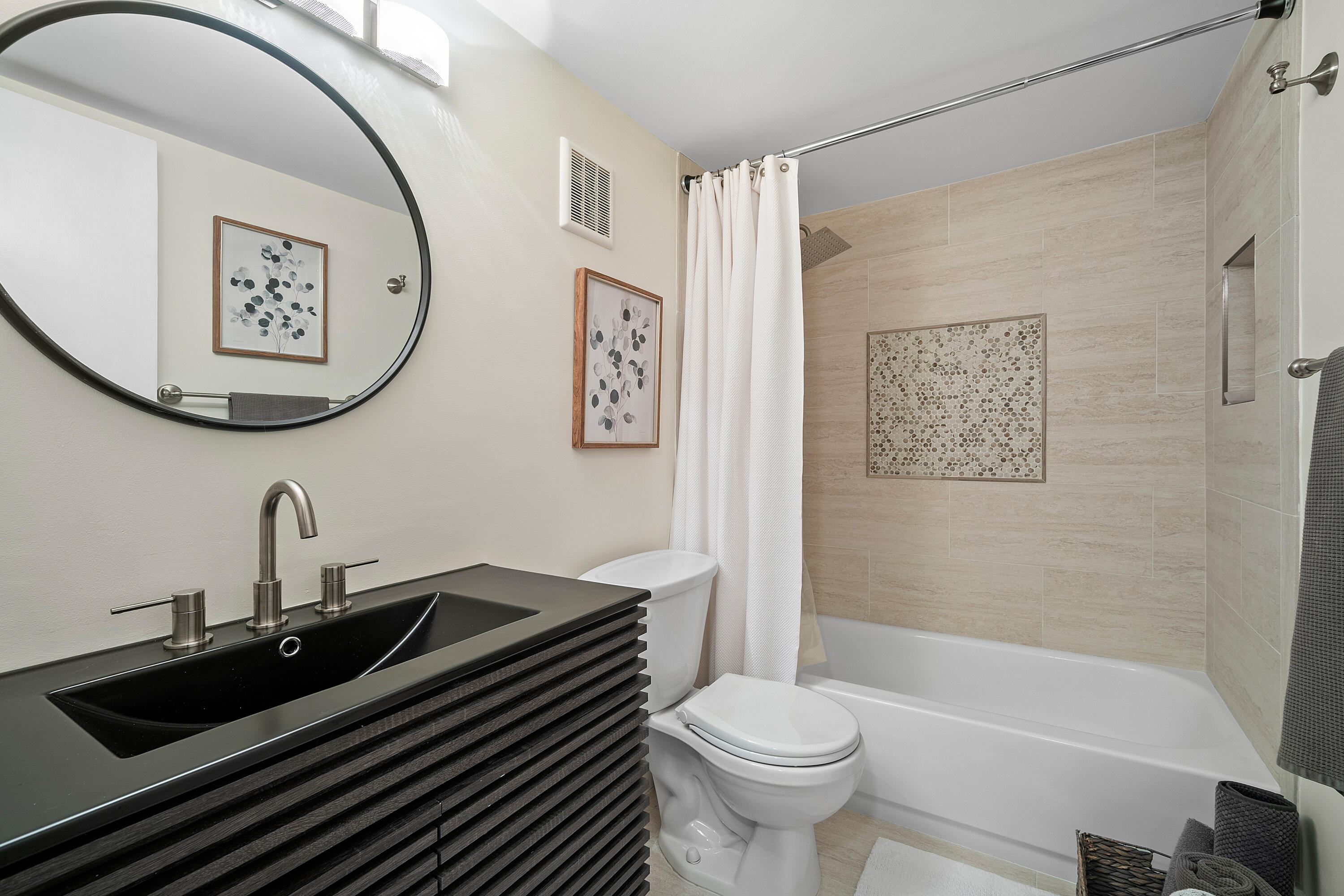 755 Dotterel Road, Unit 1312 Delray Beach, FL 33444 - Photo 15 of 21 a bathroom with a sink and a mirror