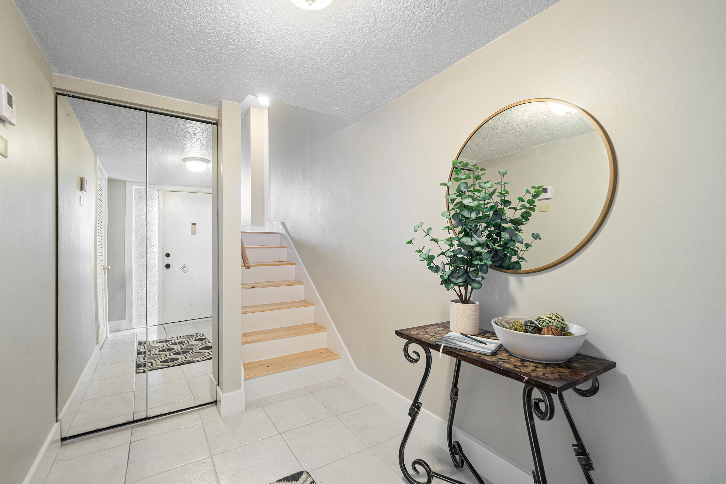 755 Dotterel Road, Unit 1312 Delray Beach, FL 33444 - Photo 2 of 21 a view of a hallway with seating area
