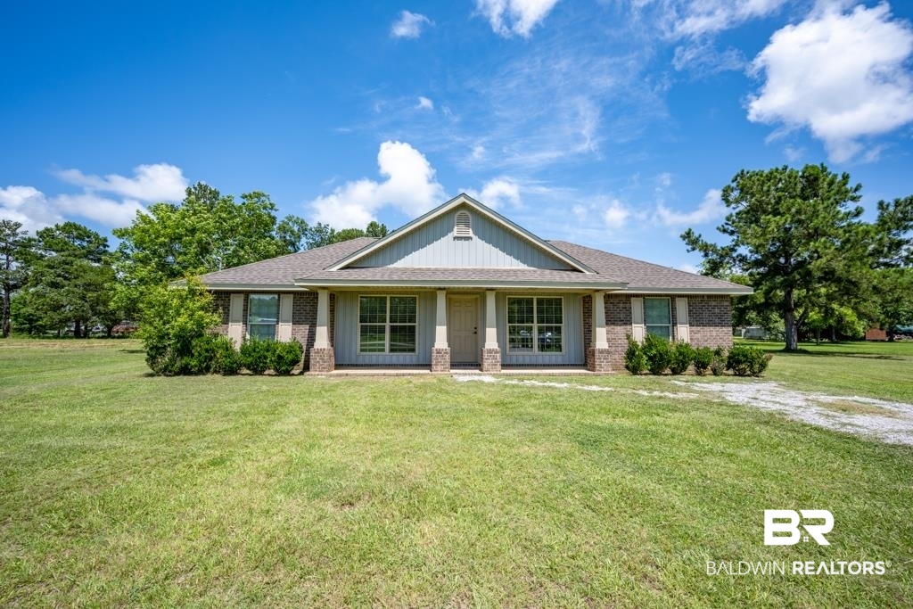 15874 Carver Road, Unit C Foley, AL 36535 - Photo 1 of 18 View of front of home featuring a front yard