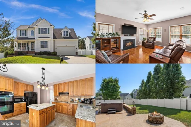 a view of a living room and kitchen with furniture