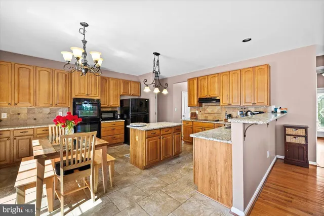 a view of entryway with wooden door