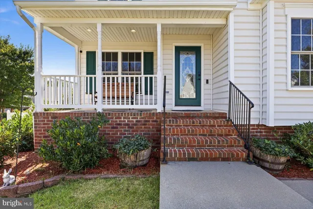 front view of a house with a garden