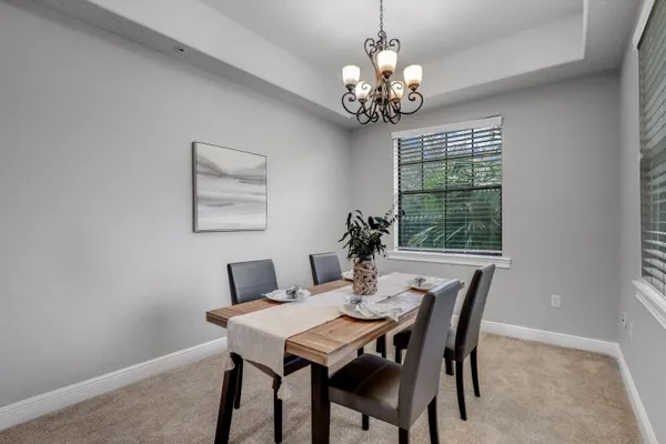 a view of a dining room with furniture