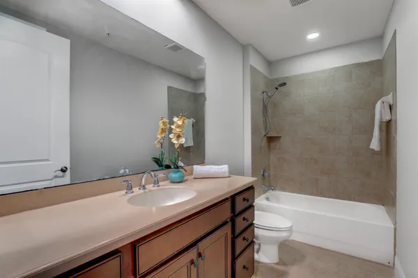 a view of a storage & utility room with a sink