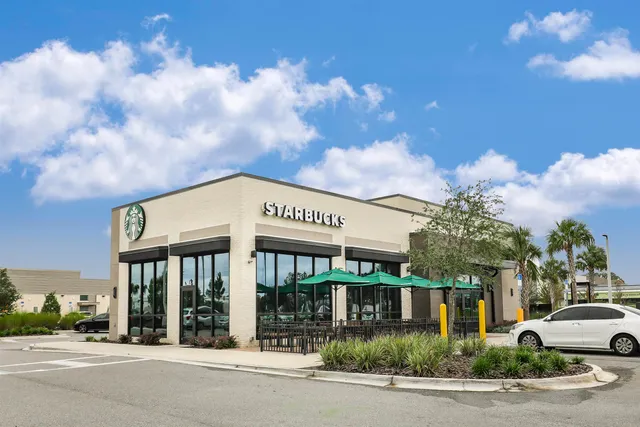 a car parked in front of a building