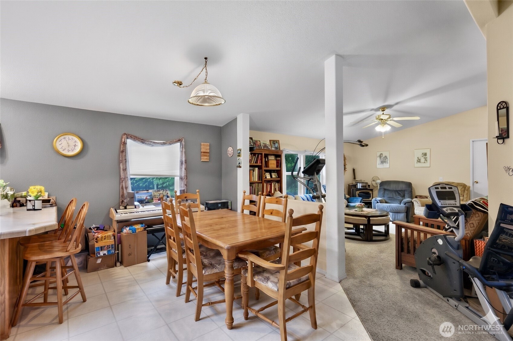 7928 Portal Way Custer, WA 98240 - Photo 15 of 39 a view of a dining room with furniture and chandelier
