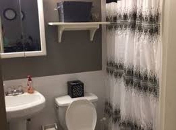 21 Aberdeen Street, Unit A Boston, MA 02215 - Photo 4 of 6 a bathroom with a toilet and a sink